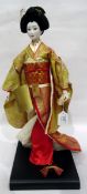 Franklin Heirloom Geisha doll on stand,