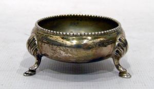 Silver circular salt with beaded rim on splayed feet, London,