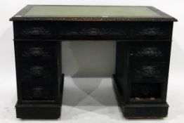 Victorian ebonised oak pedestal desk with inset writing surface,