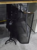 Brass and black mesh spark guard with a black painted fireside companion