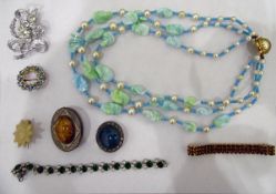 Two boxes of costume jewellery, necklaces,