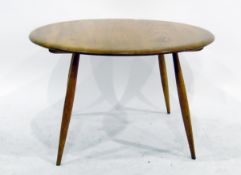Mid 20th century circular coffee table on tapering supports,