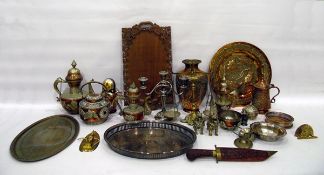 Quantity of Middle Eastern metalware to include teapots, dogs of fo, circular chargers, vase,