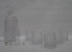 Five Swarovski miniature model birds and a set of six bark-effect tumblers with matching decanter