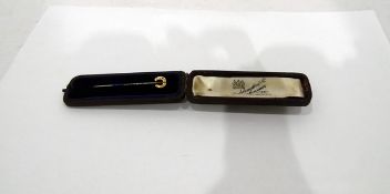 Early 20th century tiepin with 9ct gold horseshoe decoration to finial,