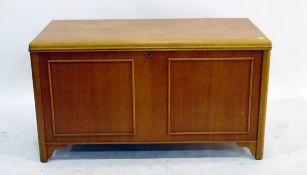 Modern cream upholstered dressing stool and a modern rectangular chest with panelled front,