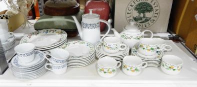 Trade Winds part tea service, white ground with green and pink, yellow foliate design,