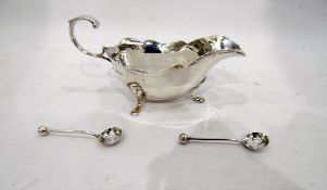 Edwardian silver sauceboat, London 1903, cut card border, scroll handle, shell legs to pad feet,