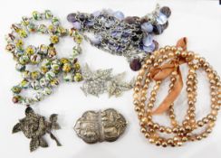 Quantity of costume jewellery to include enamel beaded necklace, faux-pearl necklace, buckle,