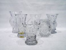 Five assorted cut glass and moulded glass vases and a cut glass jug with hobnail design (6)
