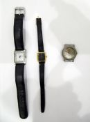 Three wristwatches