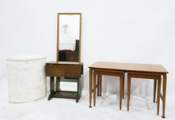 Lloyd Loom style corner linen basket, a small oak drop-flap table,