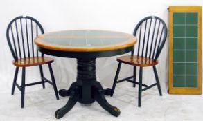 Beech and tile-topped extending kitchen dining table and a set of six green painted and beech