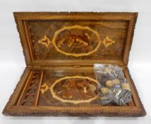 Eastern inlaid wooden games box with carved decoration to lid,