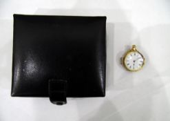 18ct gold open-faced pocket watch converted into a wristwatch, with enamel dial, Roman numerals,