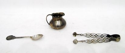 Small Victorian jug of oblate form, London 1859, a silver teaspoon having camera decorated terminal,