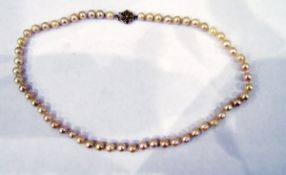 Single strand of uniform cultured pearls with a 9ct gold ropetwist clasp and a second single row of