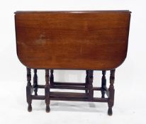 Oak fall-flap gateleg table on turned supports,