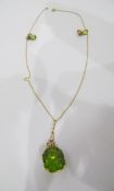 Gold, peridot, pearl and diamond pendant,