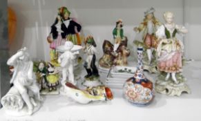 Bow white glazed figure of 'Autumn', circa 1754, seated man squeezing grape juice into a bowl, 13.