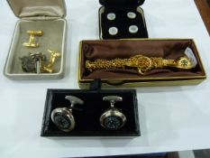 Gilt metal Bosun's whistle-pattern pendant on chain, set of four mother-of-pearl dress studs,