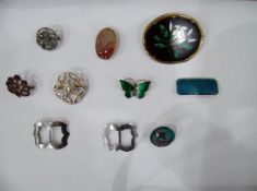 Enamel butterfly brooch, assorted silver brooches,