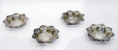 Set of four Victorian silver bonbon dishes of octagonal form with pierced and shell scroll repousse