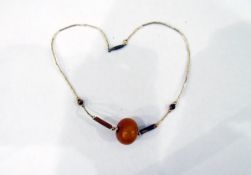 Gold-coloured and amber-coloured beaded necklace,