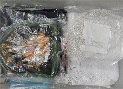 Large white damask tablecloth by Jacquard Francais, a felt embroidered tea cozy and other table