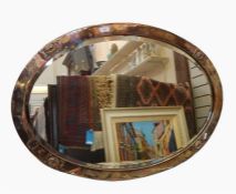 Arts & Crafts style silver plated on copper oval m