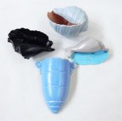 Three Poole pottery shells and a Crown Devon wall jardiniere (4)