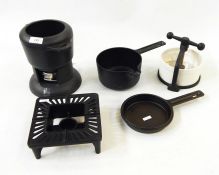 Fondue, a meat press, a cast iron saucepan circa 1976 (Robert Welch) and a cast iron hot trivet/