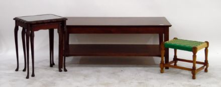Four various items comprising coffee/magazine table, string-seat stool and nest of two mahogany