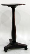 Victorian circular rosewood table raised on hexagonal pedestal and triform base, 39cm diameter