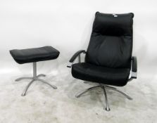 Reclining soft leather upholstered elbow chair and a footstool ensuite