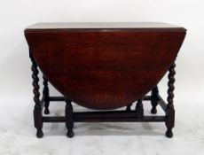 Oval oak fall-flap gateleg table on spiral turned supports, 103cm wide