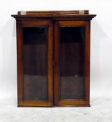 Mahogany glazed bookcase with shelves