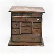 Late 18th/early 19th century oak and mahogany table top cabinet having an arrangement of twelve