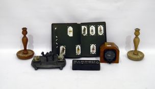 Metal desk stand with camel mount and two glass wells, an old aircraft altimeter, a pair of turned