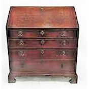 Early 19th century oak bureau, the fall revealing a fitted interior and over one shallow and three
