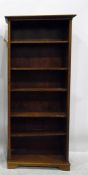 Modern pine six-tier open bookcase on plinth base,