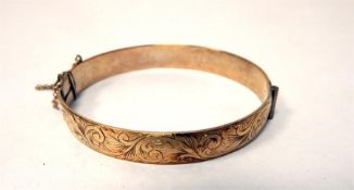 9ct gold bangle with scroll engraved decoration, 2