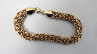 9ct gold multiple loop bracelet, 6.8g approx