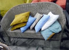 Two-seater cane conservatory settee