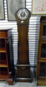 Circa 1930's oak cased grandmother clock having an