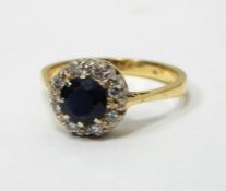 18ct gold, sapphire and diamond cluster ring, the