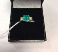 18K gold, emerald and diamond ring set centre cush