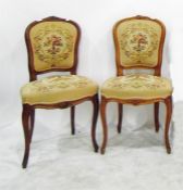 Pair of Victorian walnut framed machined floral ta