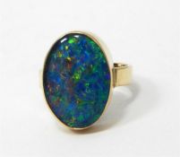 9ct gold and opal ring, the flat cabochon opal, ov