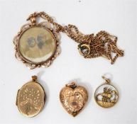 9ct gold heart-shaped locket, a gold oval locket,
